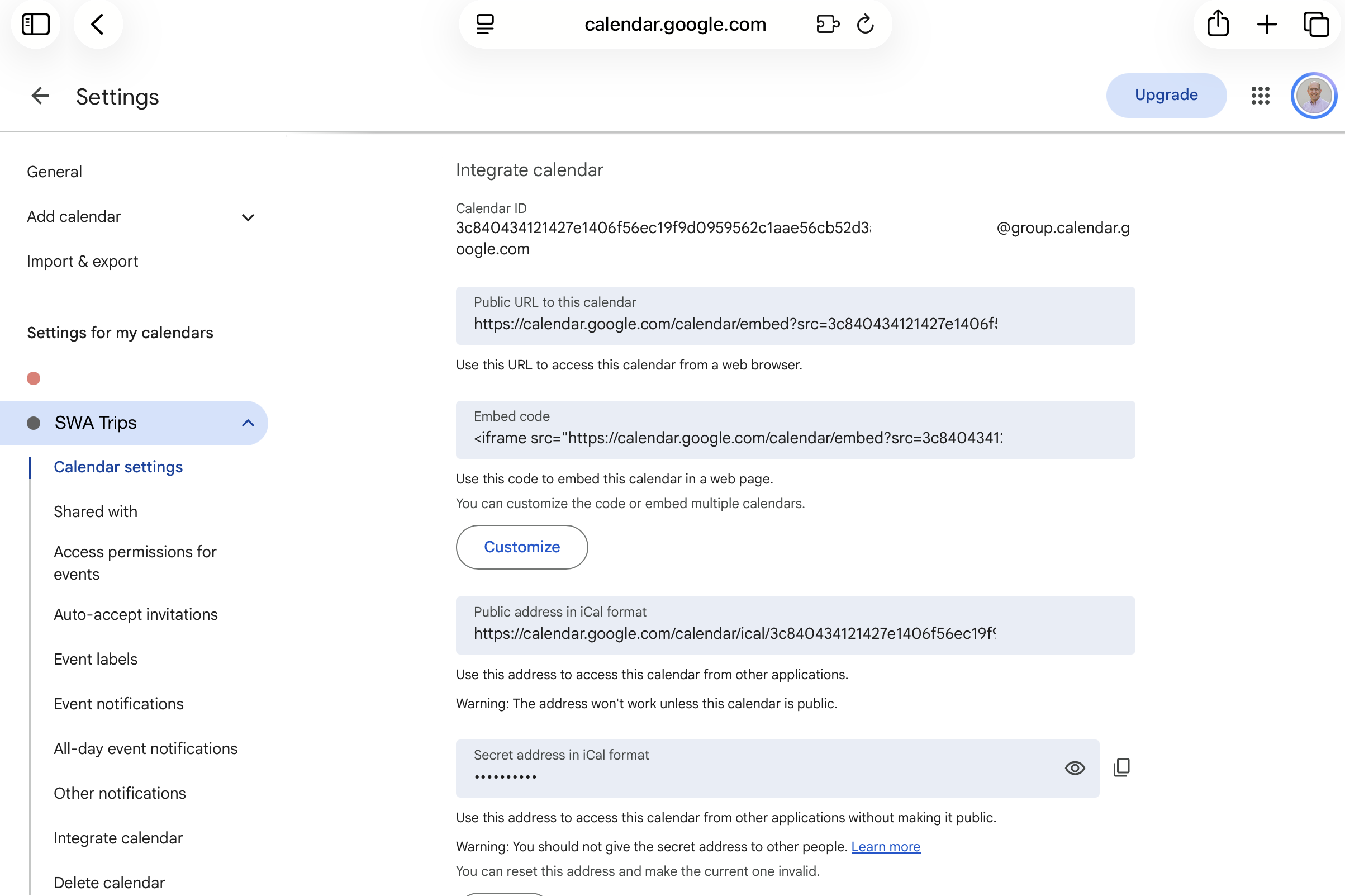 Google Calendar's Integrate calendar section, showing the Public address in iCal format and the Secret address in iCal format side by side, with the SWA Trips calendar selected